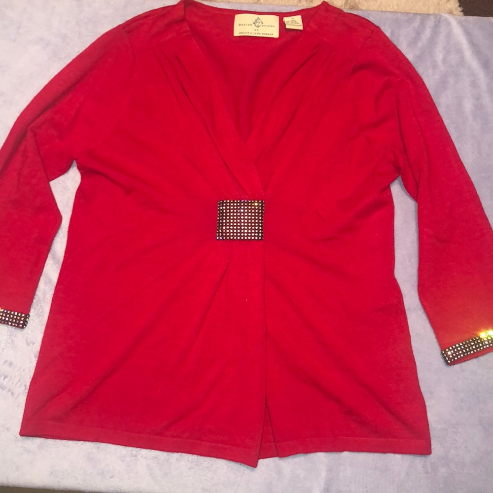 Embellished quarter length sleeves sweater.